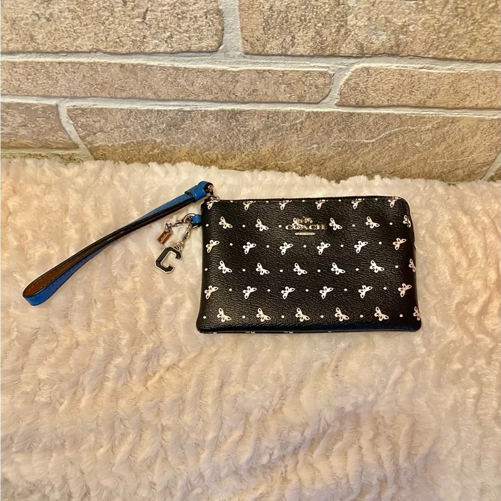Coach Black and White Butterfly Patterned Wristlet with Blue Accent - Picture 1 of 2